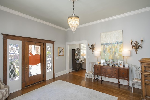 foyer entrance featuring a wealth of natural light, dark hardwood / wood-style flooring, and a chandelier