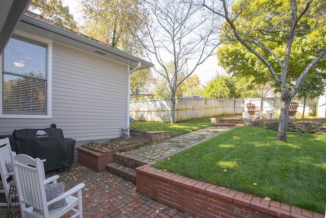 view of yard with a patio area