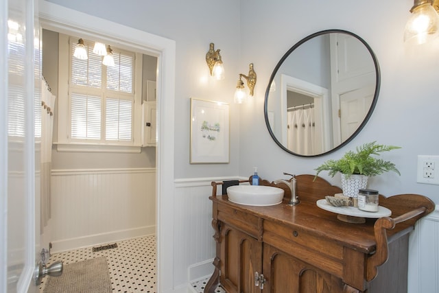 bathroom featuring tile patterned floors and vanity