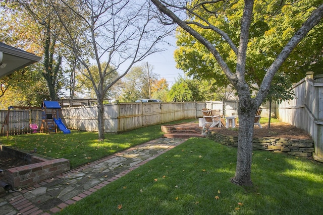 view of yard with a playground