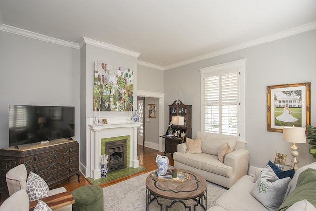 living room with ornamental molding and hardwood / wood-style floors