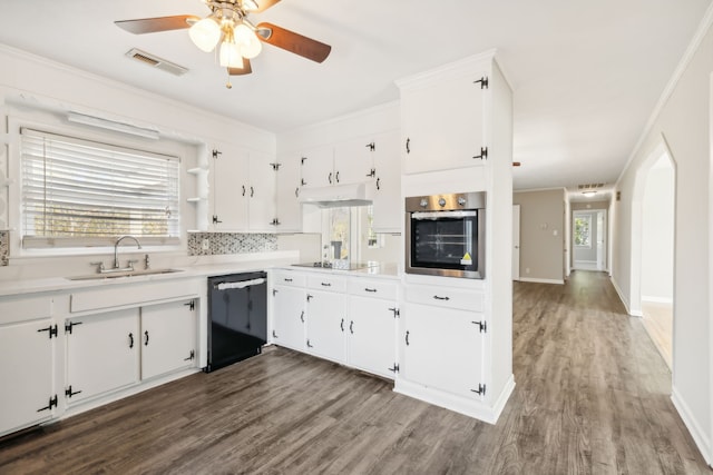 kitchen with hardwood / wood-style floors, sink, black appliances, crown molding, and white cabinets