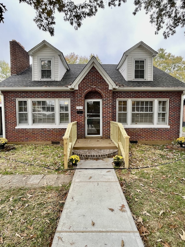 view of front of house with a front lawn