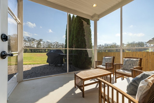 sunroom / solarium with a wealth of natural light