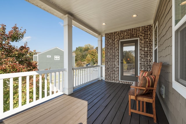 wooden deck featuring a porch