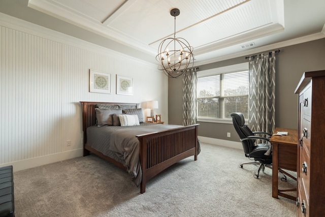 carpeted bedroom with a chandelier, a raised ceiling, and crown molding