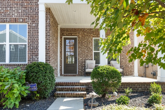 doorway to property with a porch