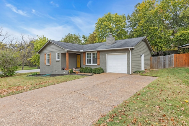 ranch-style home with a front yard and a garage