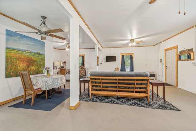 living room with crown molding and concrete flooring