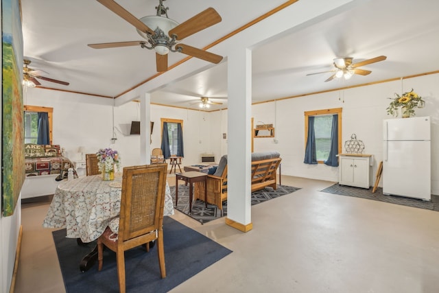 dining area with concrete flooring