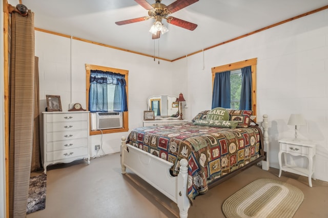 bedroom featuring ornamental molding, cooling unit, concrete flooring, and ceiling fan