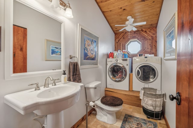 bathroom featuring lofted ceiling, wood ceiling, ceiling fan, toilet, and washer and clothes dryer