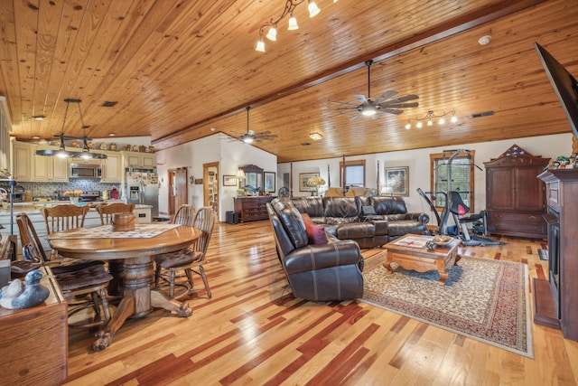 living room featuring lofted ceiling, wood ceiling, light hardwood / wood-style floors, and ceiling fan