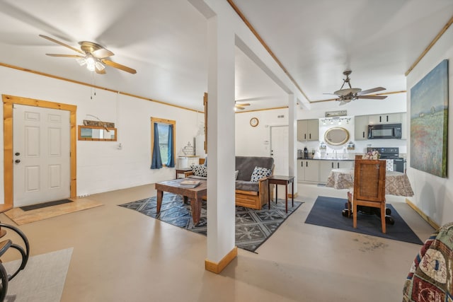 living room with concrete floors, sink, and ceiling fan