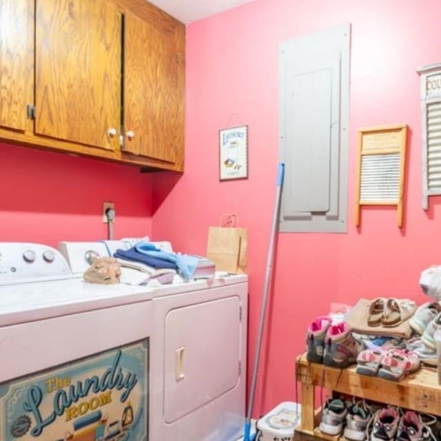 laundry area with cabinets and washing machine and dryer