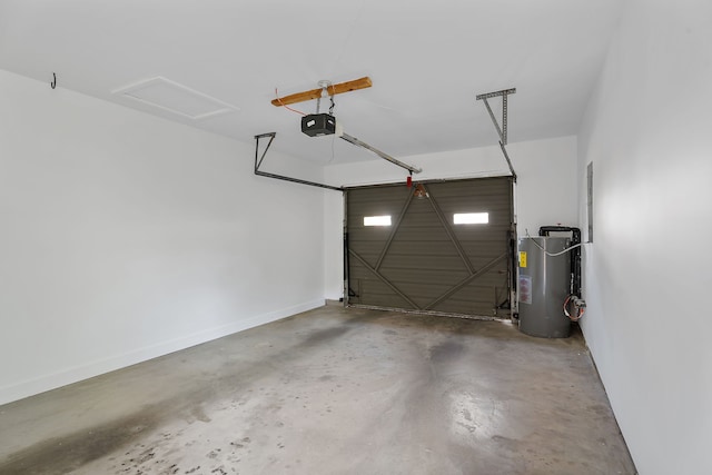 garage featuring a garage door opener and water heater