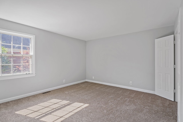 view of carpeted spare room