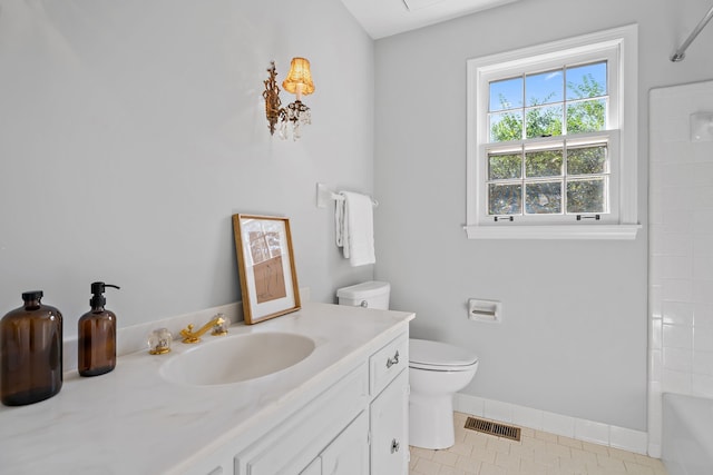 full bathroom featuring shower / tub combination, vanity, toilet, and tile patterned flooring