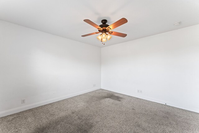 empty room with carpet and ceiling fan