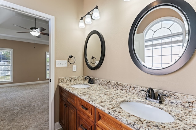 bathroom featuring vanity, ornamental molding, and ceiling fan