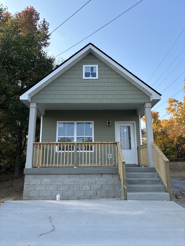 bungalow featuring covered porch