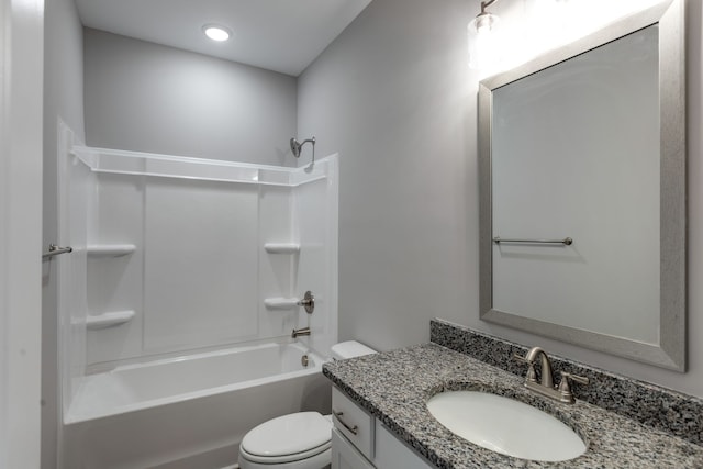 full bathroom with shower / bathing tub combination, vanity, and toilet