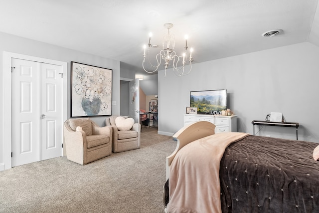 carpeted bedroom with vaulted ceiling and an inviting chandelier