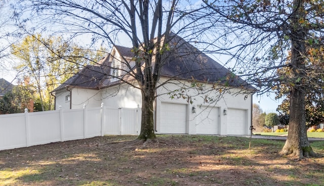 exterior space featuring a garage