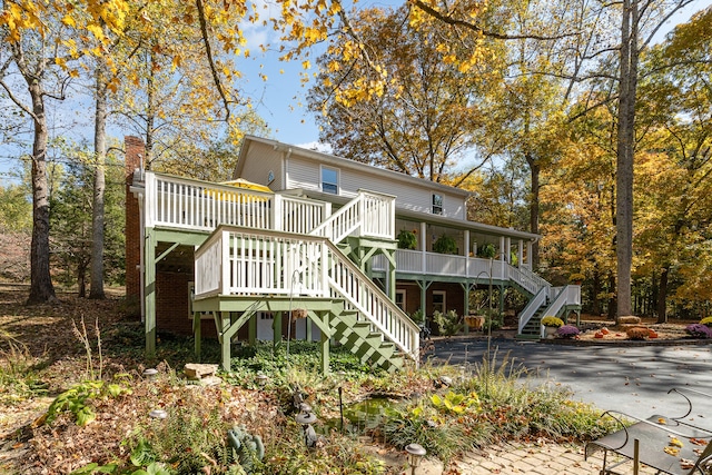 rear view of house with a deck