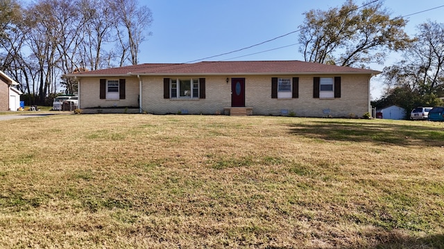 single story home featuring a front yard