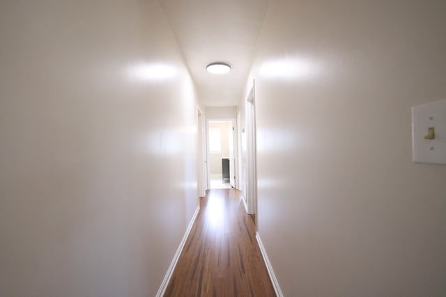 hall featuring wood-type flooring