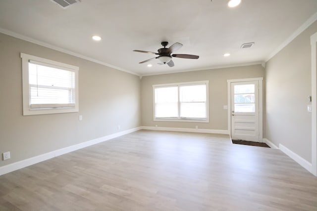 interior space with crown molding, light wood-type flooring, and ceiling fan