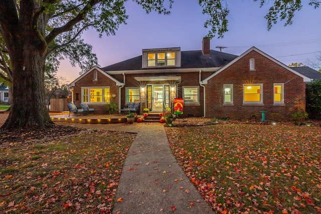 view of front of property featuring covered porch