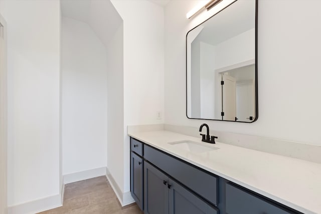 bathroom with vanity and tile patterned flooring