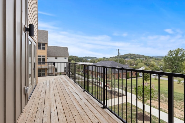 deck featuring a lawn