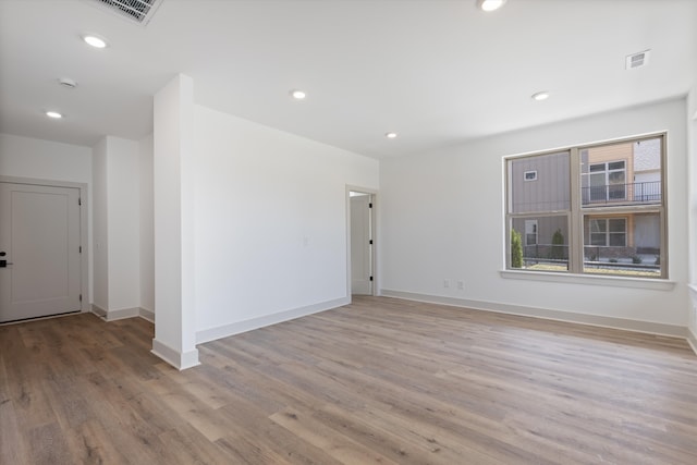 empty room with light wood-type flooring