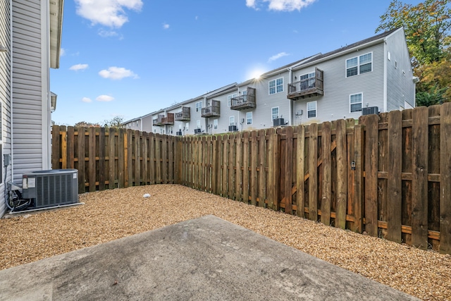 view of yard featuring a patio area and cooling unit