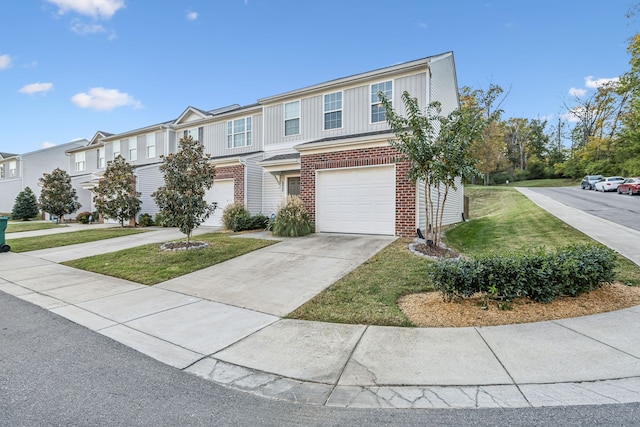 view of front of home featuring a garage and a front lawn