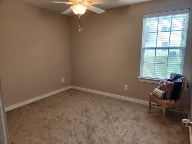 unfurnished room featuring carpet and ceiling fan