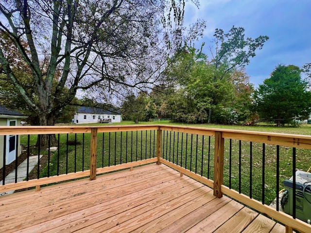 deck featuring a yard