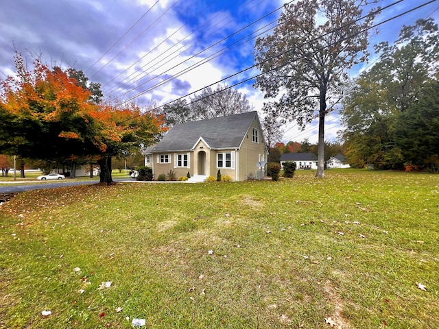 view of front of home featuring a front yard