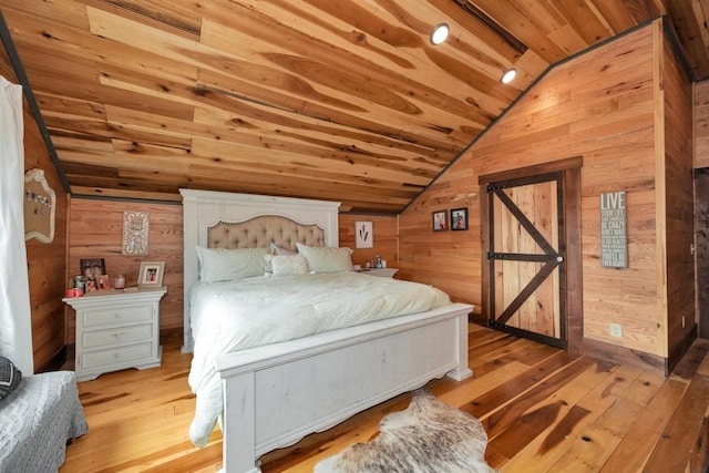700 Kincaid Rd, Minor Hill, TN 38473 - bedroom featuring wooden walls, wooden ceiling, light wood finished floors, and lofted ceiling