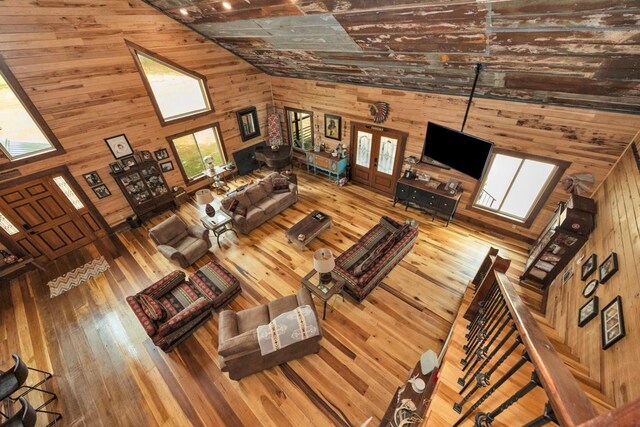 700 Kincaid Rd, Minor Hill, TN 38473 - living area with wood walls, high vaulted ceiling, and hardwood / wood-style flooring
