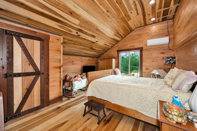 bedroom with wood-type flooring, wood ceiling, an AC wall unit, vaulted ceiling, and wooden walls