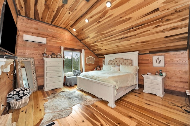 bedroom featuring wood walls, a wall mounted air conditioner, wood ceiling, vaulted ceiling, and light hardwood / wood-style flooring