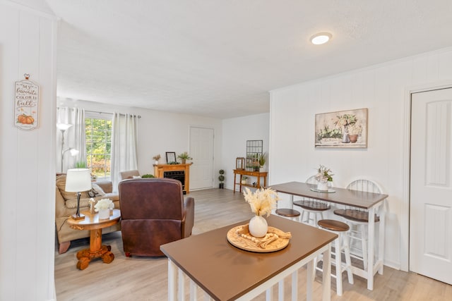 dining area with light hardwood / wood-style flooring