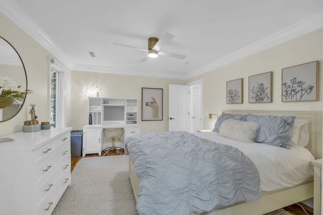 bedroom with light hardwood / wood-style flooring, crown molding, and ceiling fan