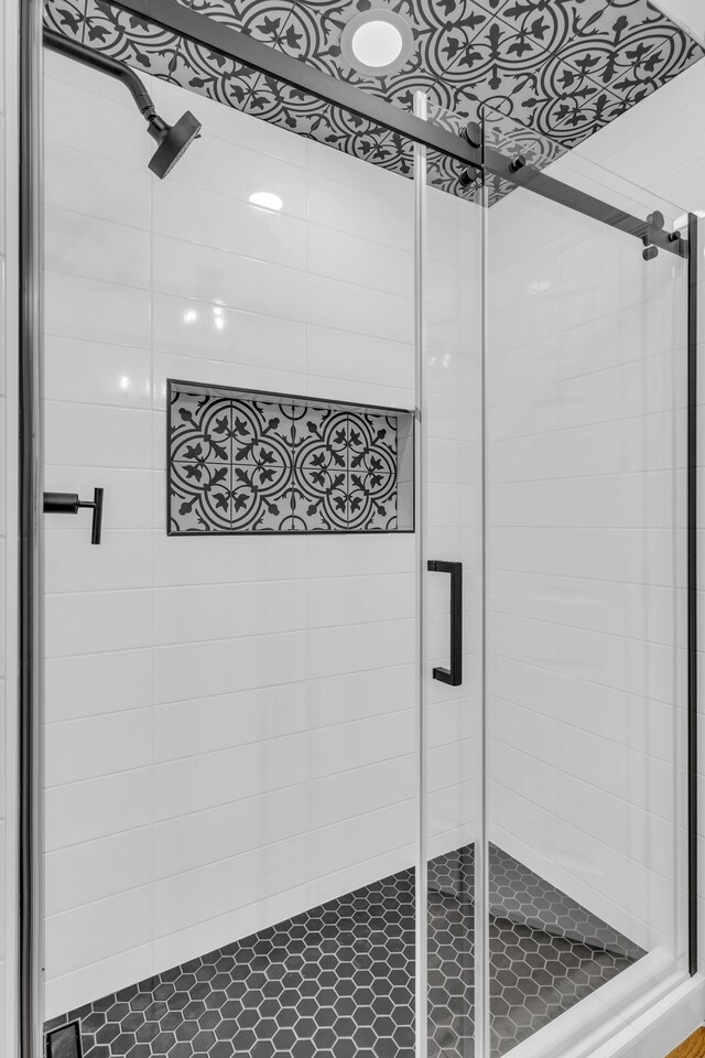 bathroom featuring walk in shower