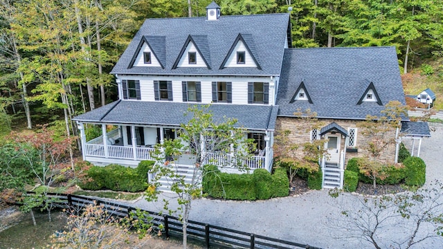 view of front of property featuring covered porch