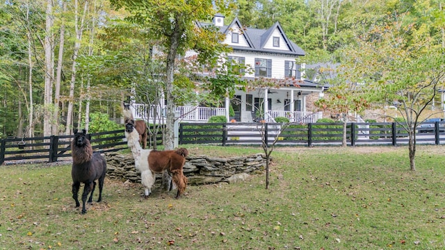 view of front facade with a porch and a front lawn